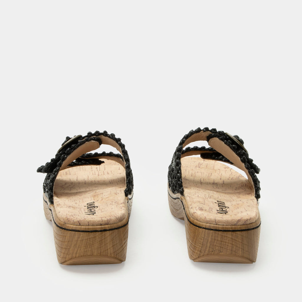 Oona Black sandal on a Wood look rocker outsole | Slide on sandal with two straps and a black braided leather upper.