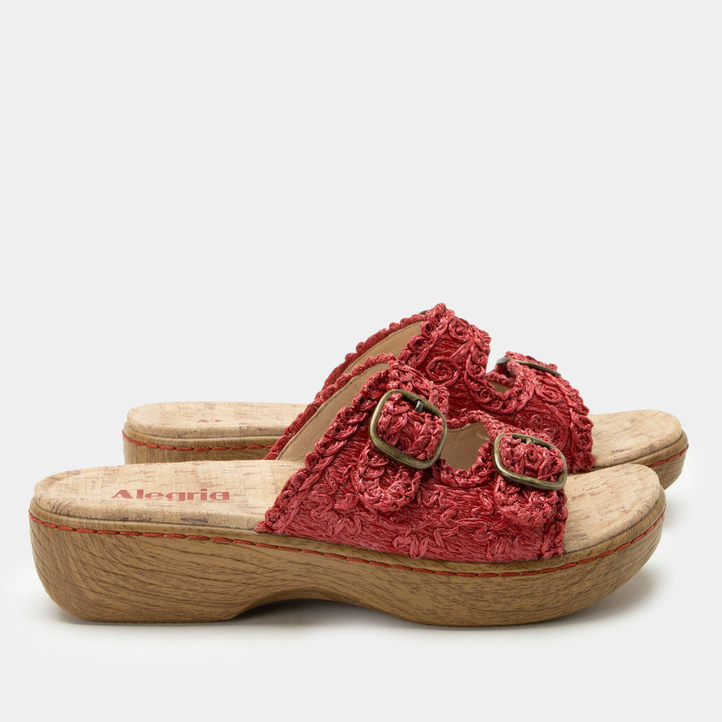 Oona Red sandal on a Wood look rocker outsole | Slide on sandal with two straps and a red braided leather upper.