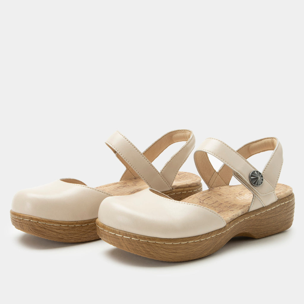 Opal Oat mary jane shoe on a Wood look rocker outsole | Mary jane style with a cream leather upper.