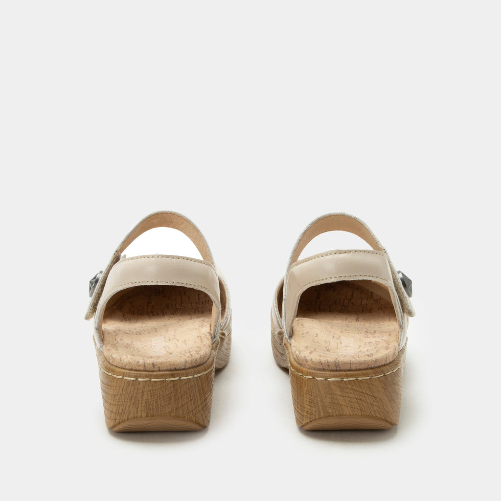 Opal Oat mary jane shoe on a Wood look rocker outsole | Mary jane style with a cream leather upper.