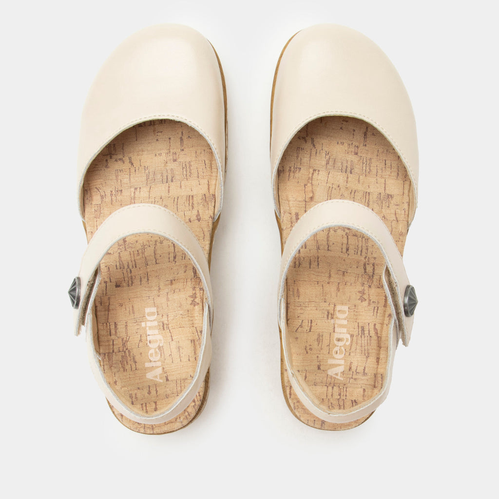 Opal Oat mary jane shoe on a Wood look rocker outsole | Mary jane style with a cream leather upper.