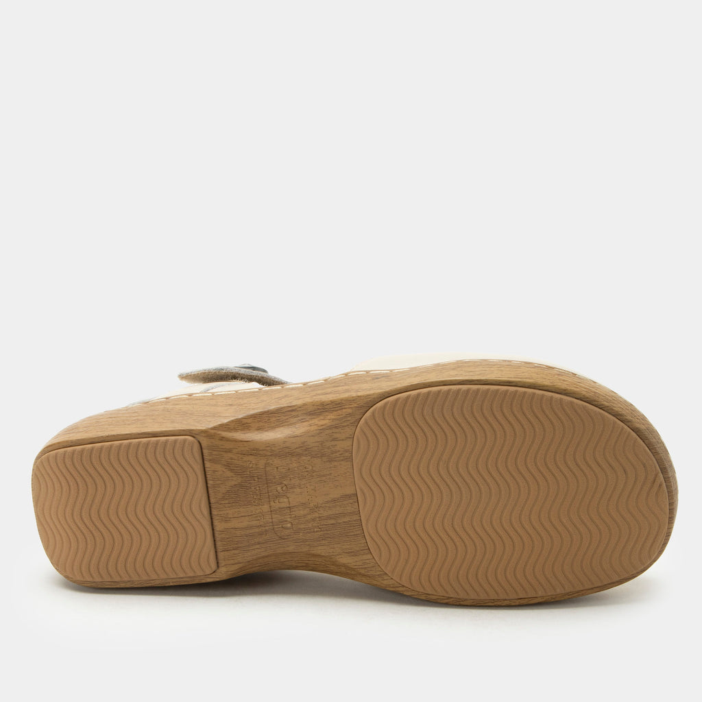 Opal Oat mary jane shoe on a Wood look rocker outsole | Mary jane style with a cream leather upper.