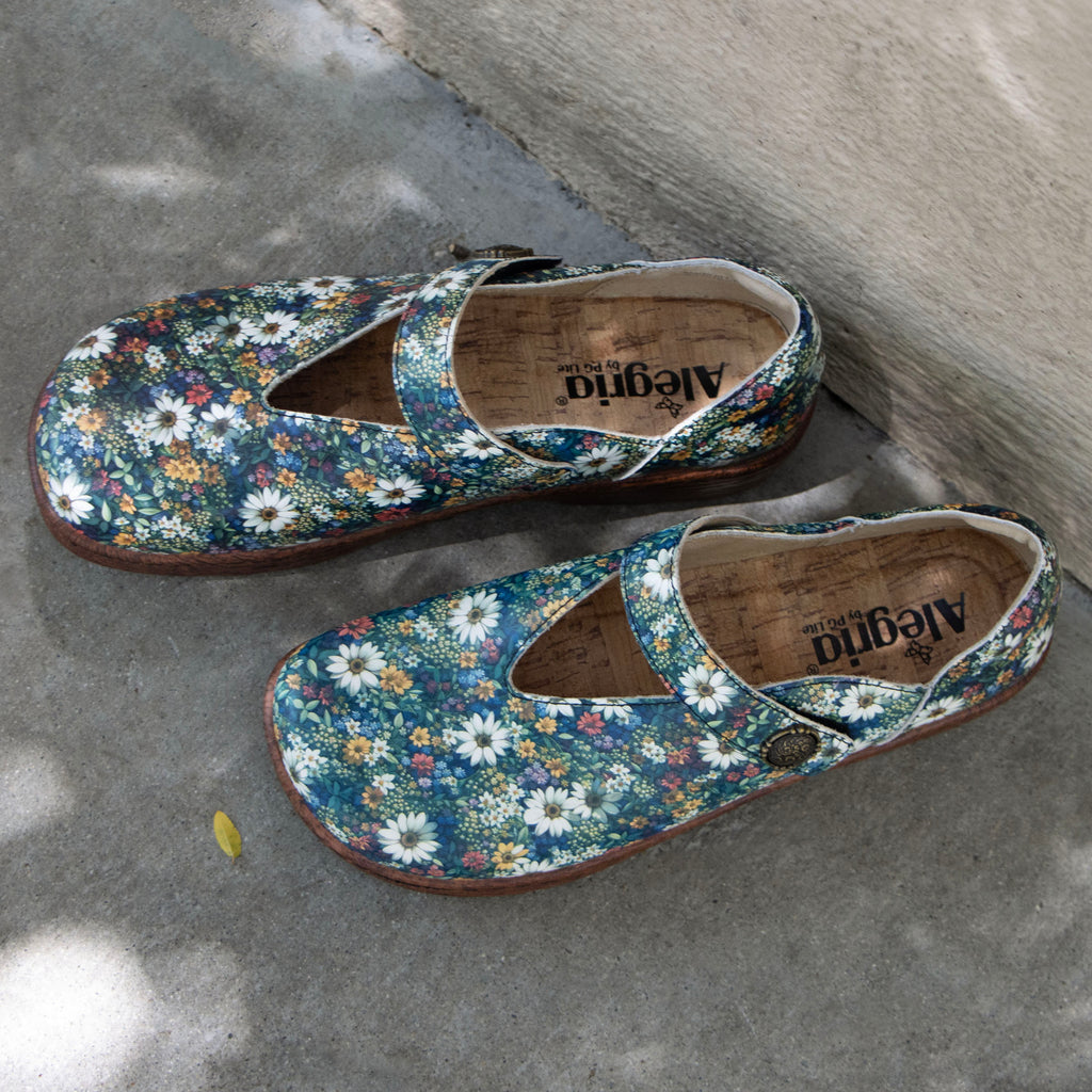 Opheliah Sugar N' Spice slip on style shoe on a Wood look rocker outsole | Multi color florals with a brown outsole.