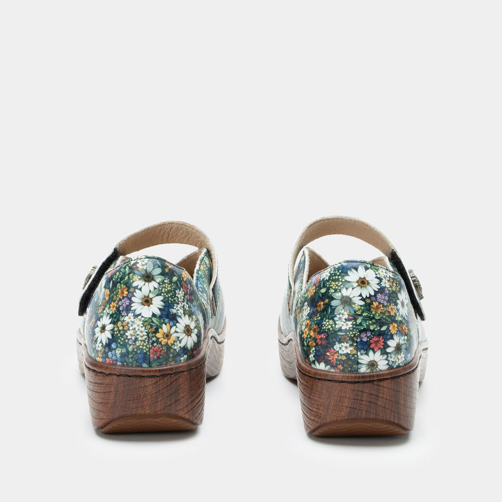 Opheliah Sugar N' Spice slip on style shoe on a Wood look rocker outsole | Multi color florals with a brown outsole.