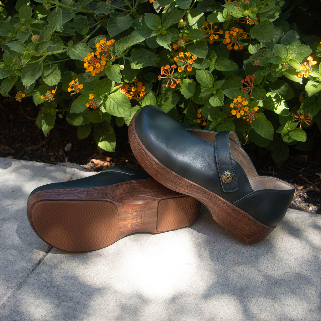 Opheliah Tree Hugs slip on style shoe on a Wood look rocker outsole |Black leather with brown outsole.