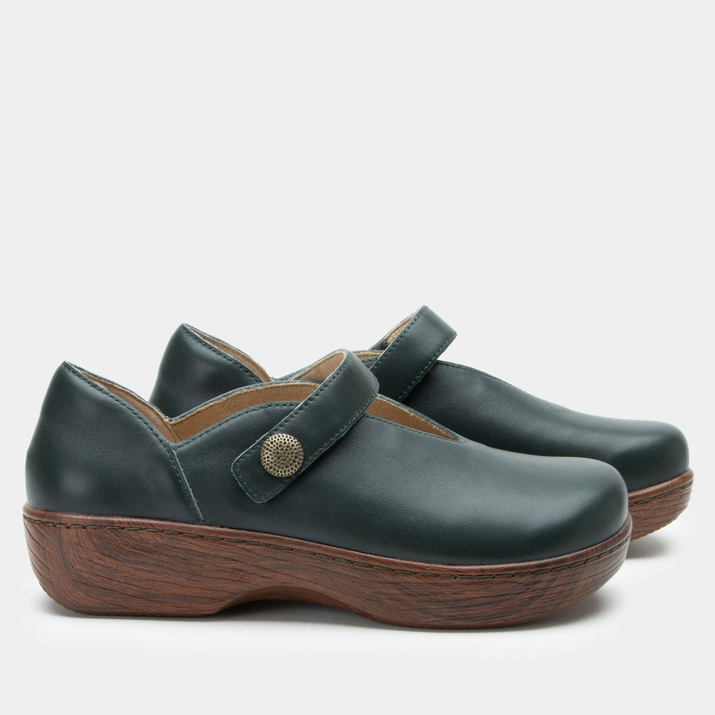 Opheliah Tree Hugs slip on style shoe on a Wood look rocker outsole |Black leather with brown outsole.