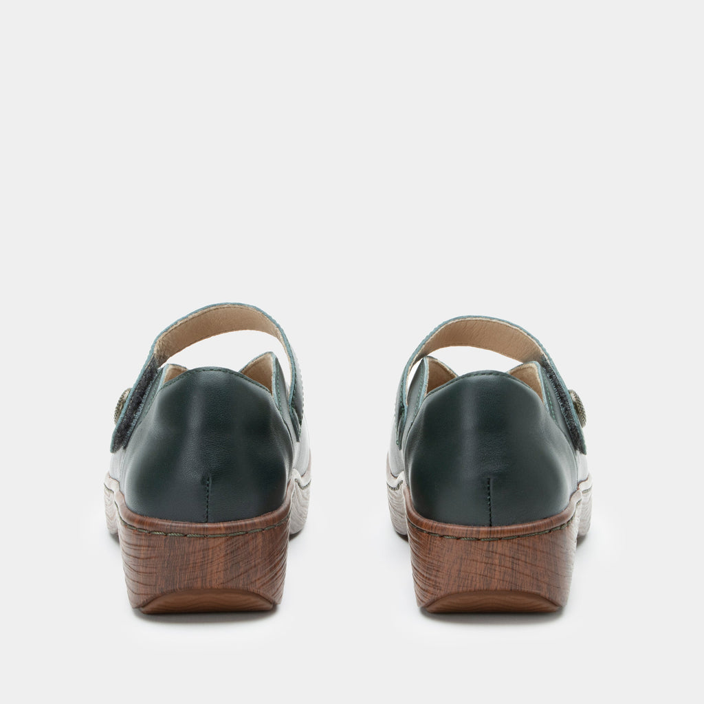 Opheliah Tree Hugs slip on style shoe on a Wood look rocker outsole |Black leather with brown outsole.