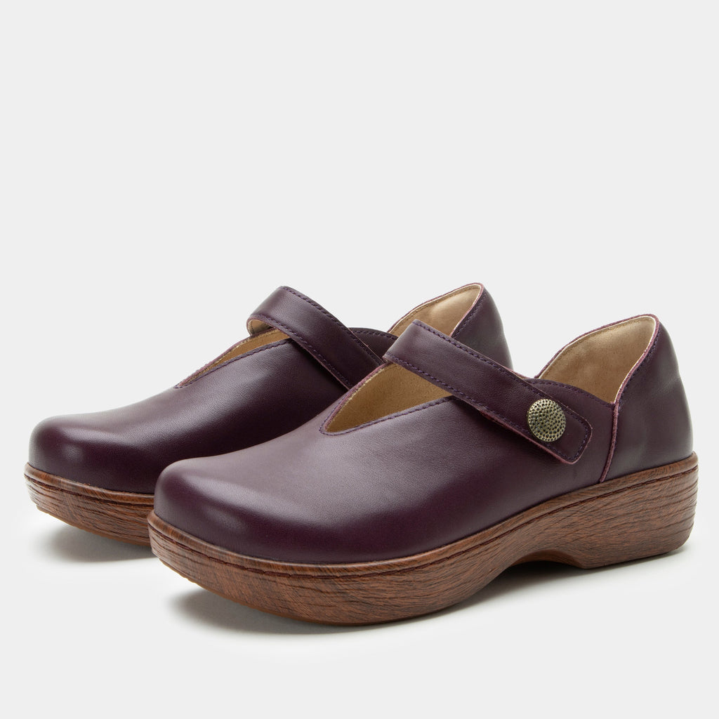 Opheliah Wino Forever slip on style shoe on a Wood look rocker outsole |Burgundy leather with a brown outsole.