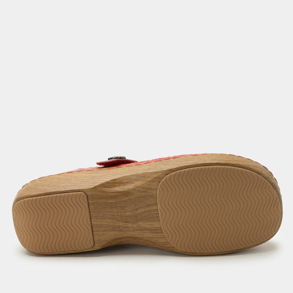 Opheliah Razberry Breeze slip on style shoe on a Wood look rocker outsole | Red leather upper with laser cutouts and stitching details.