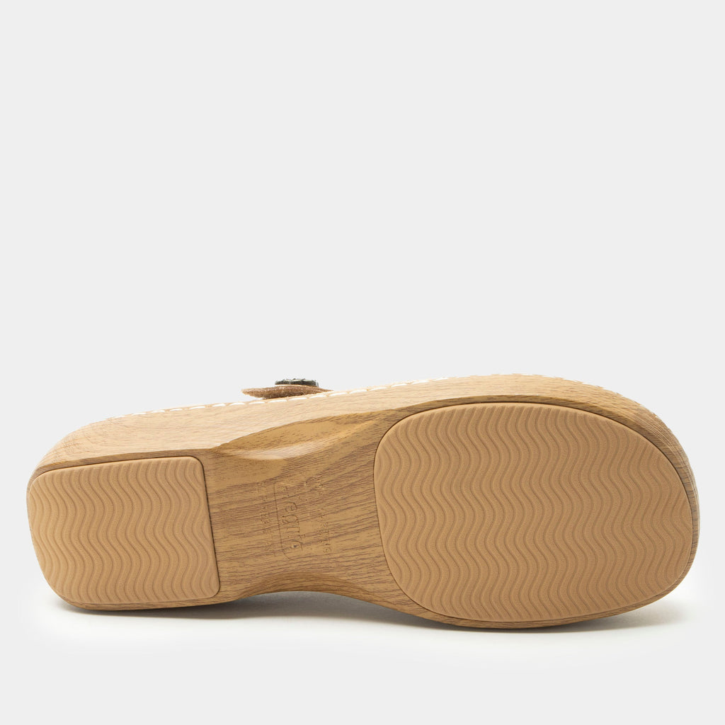 Opheliah Latte Breeze slip on style shoe on a Wood look rocker outsole |Tan leather upper with laser cutouts and stitching details.