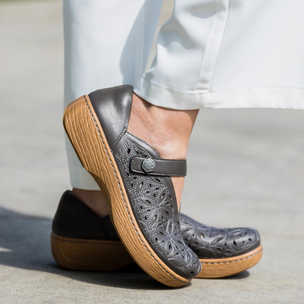 Opheliah Stone Breeze slip on style shoe on a Wood look rocker outsole - Grey leather upper with laser cutouts and stitching details.