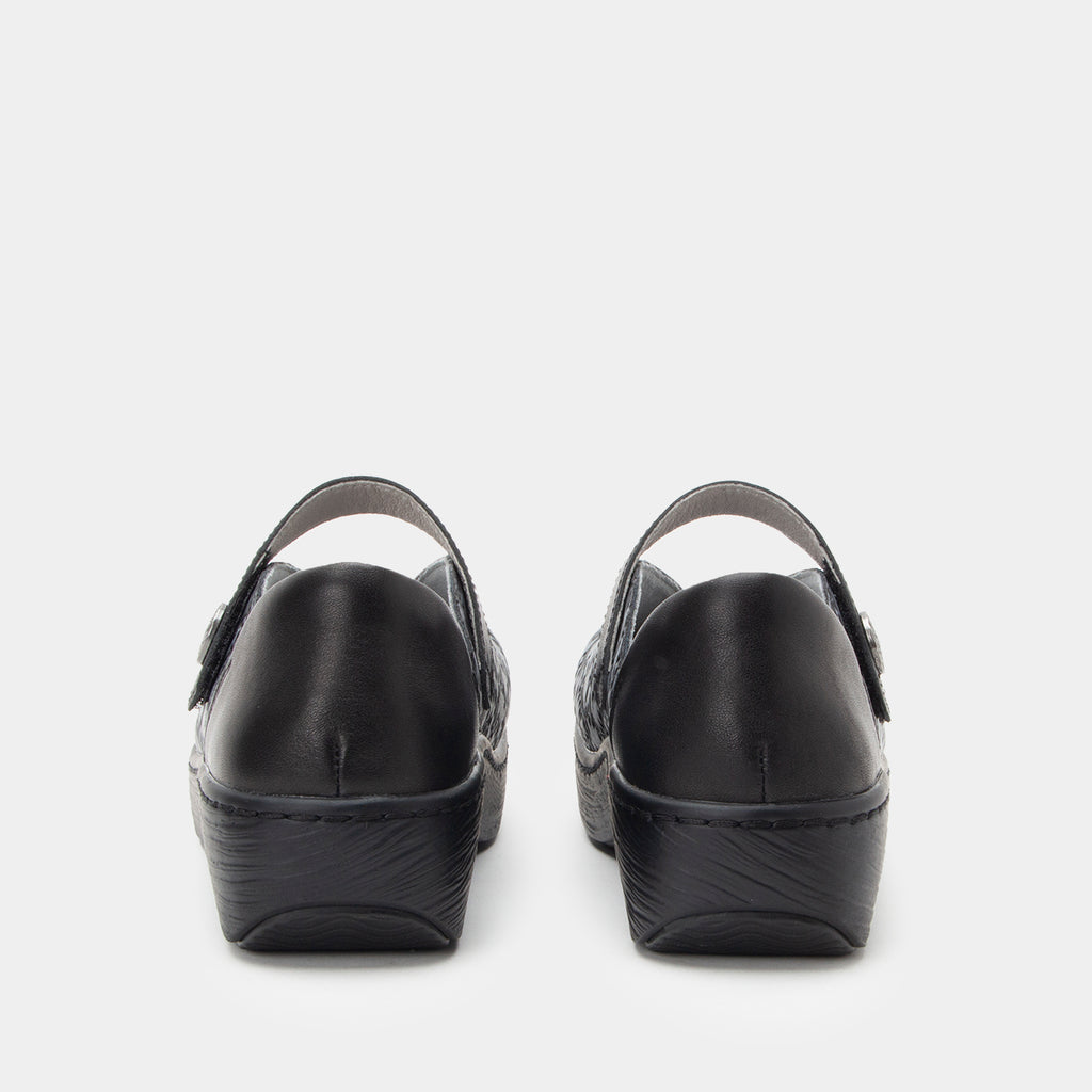 Opheliah Ivy Brush Silver mary-jane style shoe on a Wood look rocker outsole.  