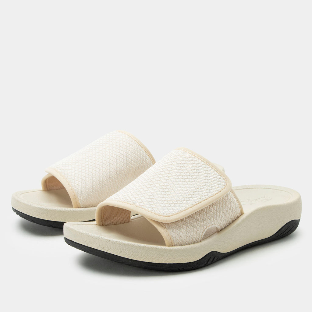 Ova8tion Beige sandal on a Ergo Foam outsole | Beige slide on sandal with a mesh upper and lining.