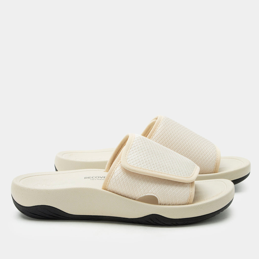 Ova8tion Beige sandal on a Ergo Foam outsole | Beige slide on sandal with a mesh upper and lining.