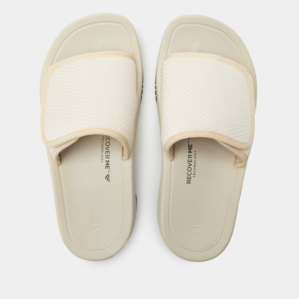 Ova8tion Beige sandal on a Ergo Foam outsole | Beige slide on sandal with a mesh upper and lining.