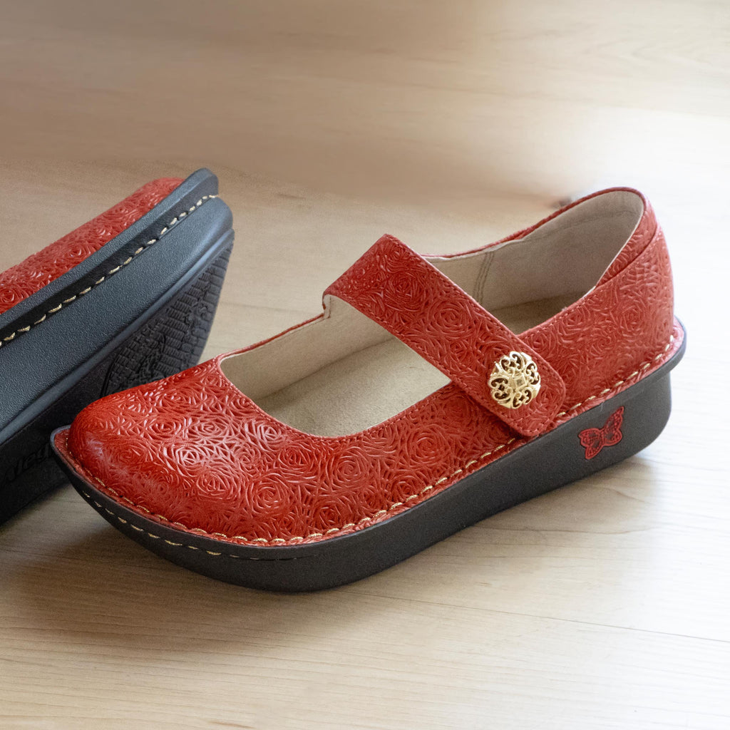 Paloma Coralita Mary Jane on a Classic rocker outsole | Coral colored mary jane shoe with laser etched leather uppers.