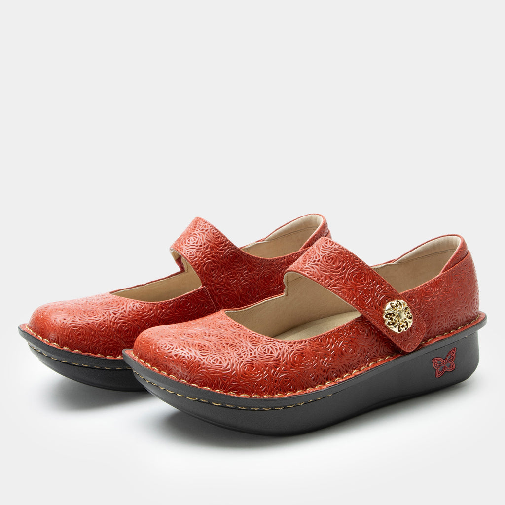 Paloma Coralita Mary Jane on a Classic rocker outsole | Coral colored mary jane shoe with laser etched leather uppers.