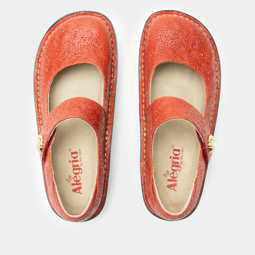 Paloma Coralita Mary Jane on a Classic rocker outsole | Coral colored mary jane shoe with laser etched leather uppers.