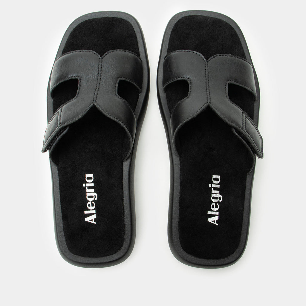 Portia Black sandal| Black leather slide on sandal on a lightwight outsole.