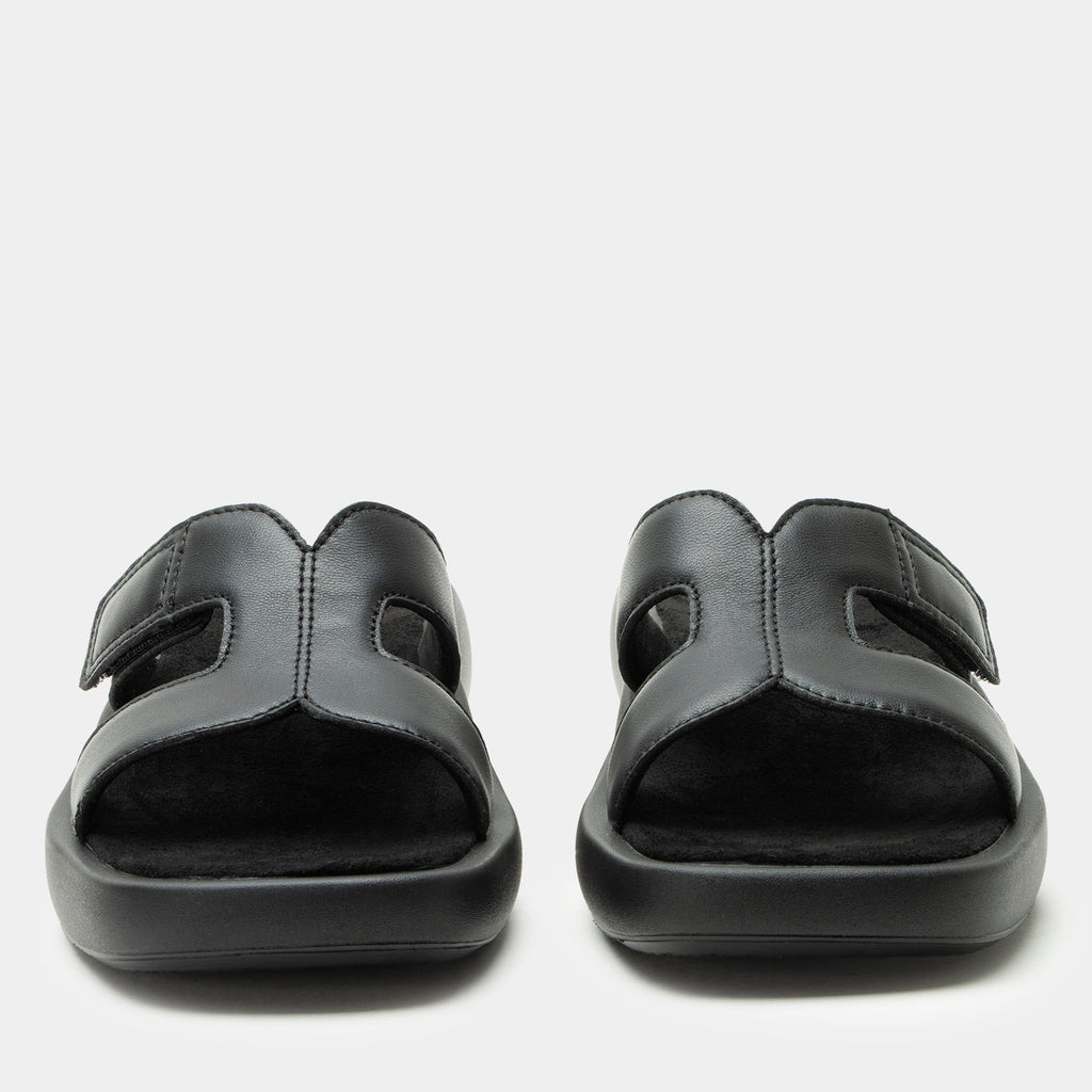 Portia Black sandal| Black leather slide on sandal on a lightweight outsole.