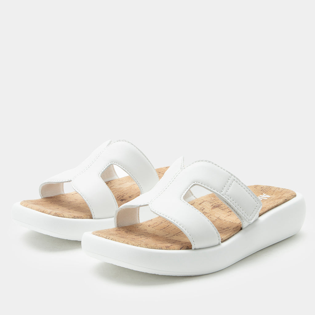 Portia All White sandal| white leather slide on sandal on a lightweight outsole.