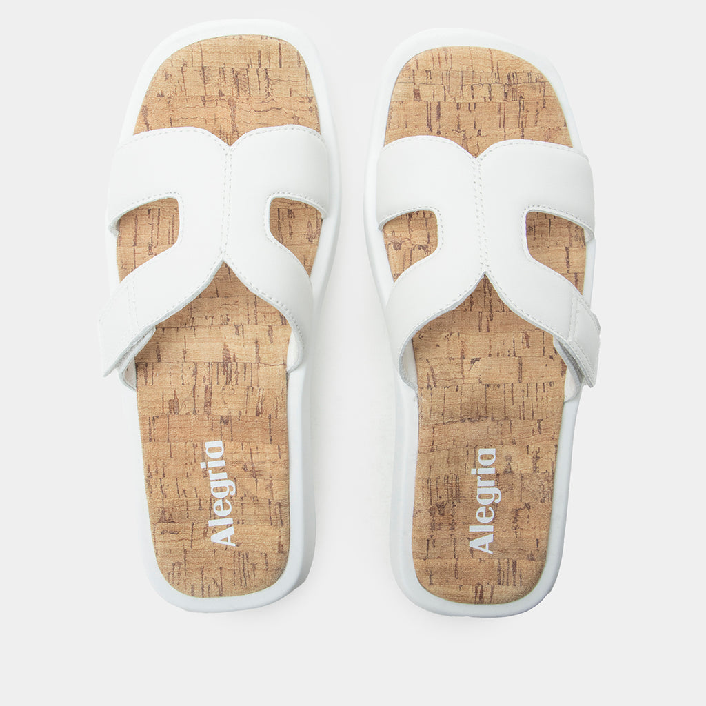 Portia All White sandal| white leather slide on sandal on a lightweight outsole.