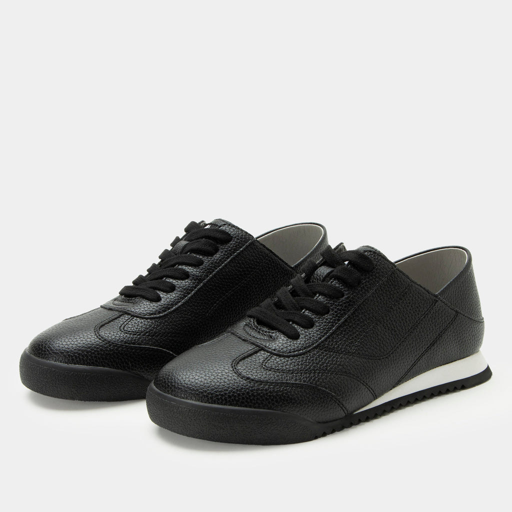 Reagan Black shoe on a lightweight Retro sport outsole. | Black lace up shoe on vegan leather uppers.