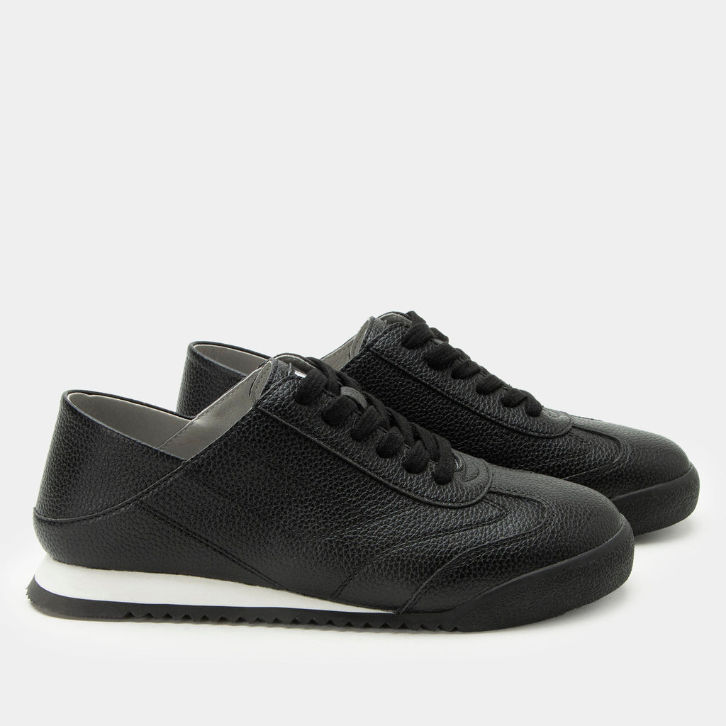 Reagan Black shoe on a lightweight Retro sport outsole. | Black lace up shoe on vegan leather uppers.