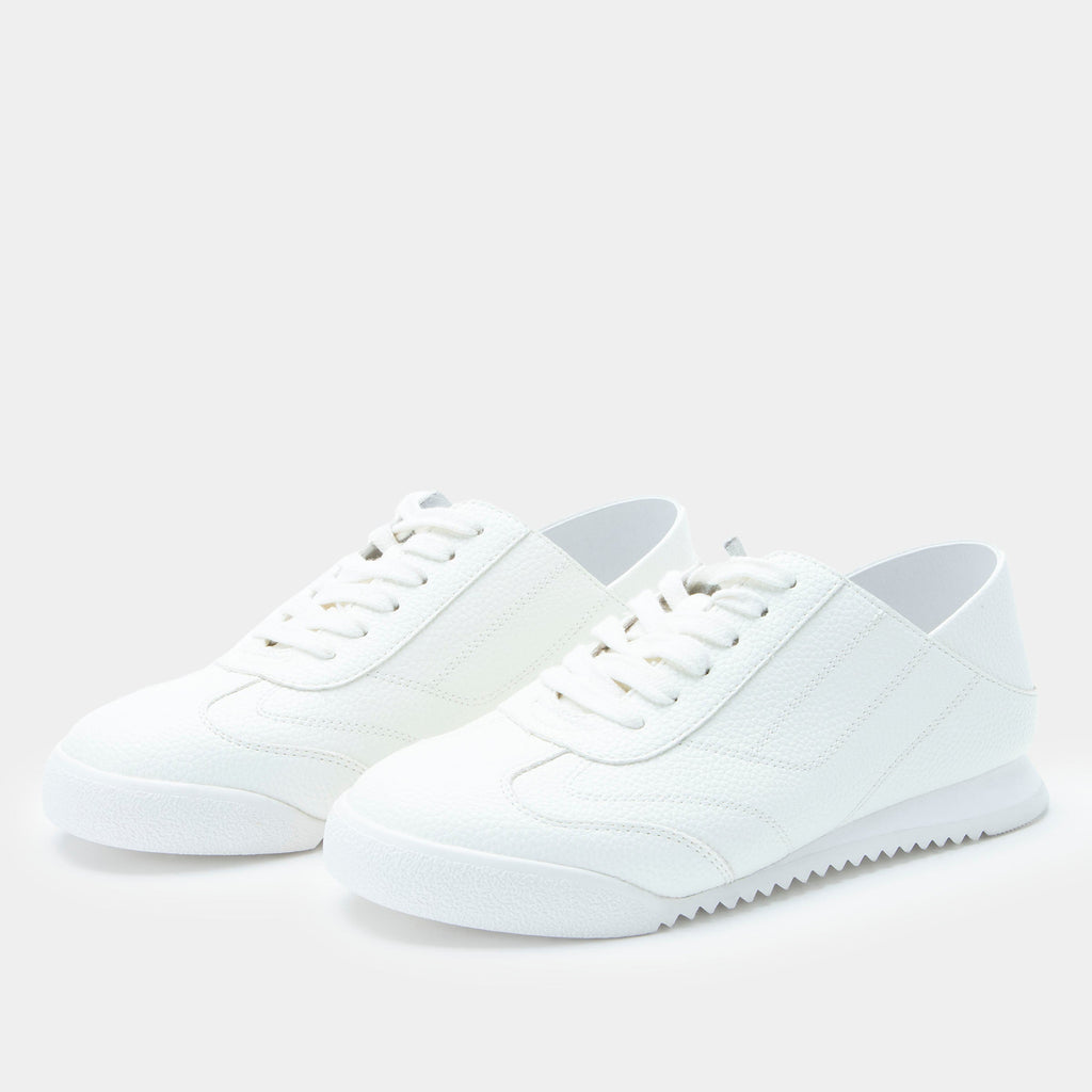 Reagan White shoe on a lightweight Retro sport outsole. | White lace up shoe on vegan leather uppers.