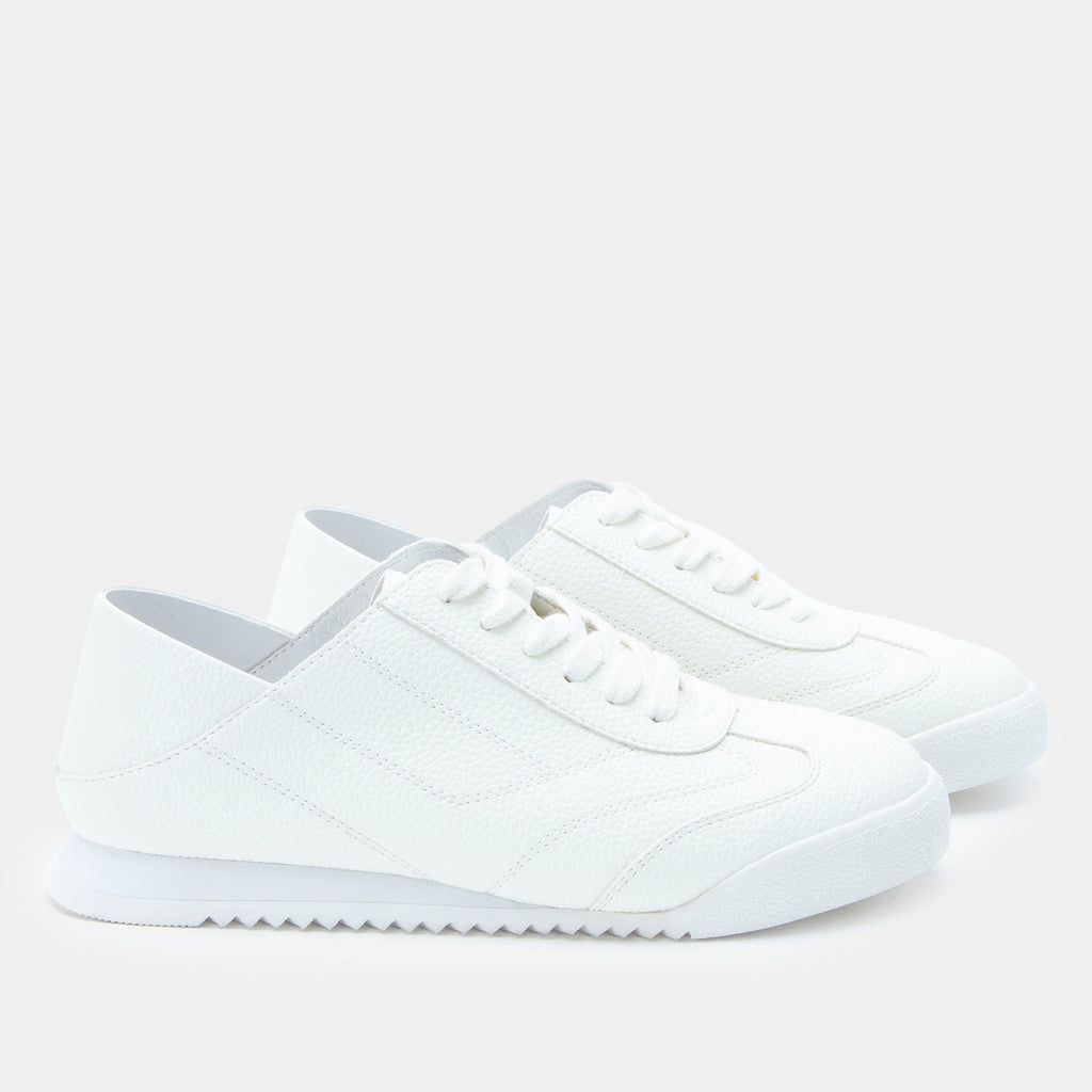 Reagan White shoe on a lightweight Retro sport outsole. | White lace up shoe on vegan leather uppers.