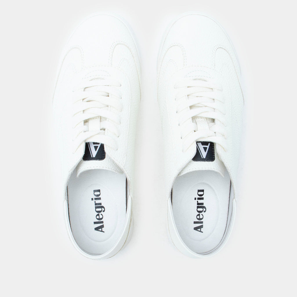 Reagan White shoe on a lightweight Retro sport outsole. | White lace up shoe on vegan leather uppers.