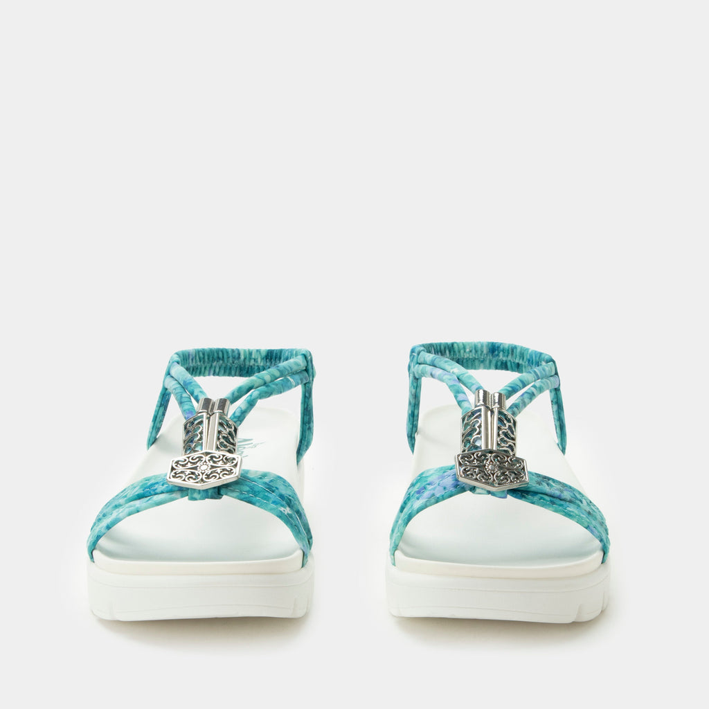 Roz Aqua Flora t-strap sandal | Blue braided vegan uppers and decorative sliver hardware.