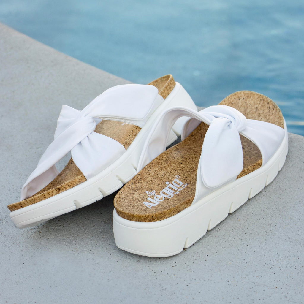 Rylie White slide on sandal on a heritage outsole