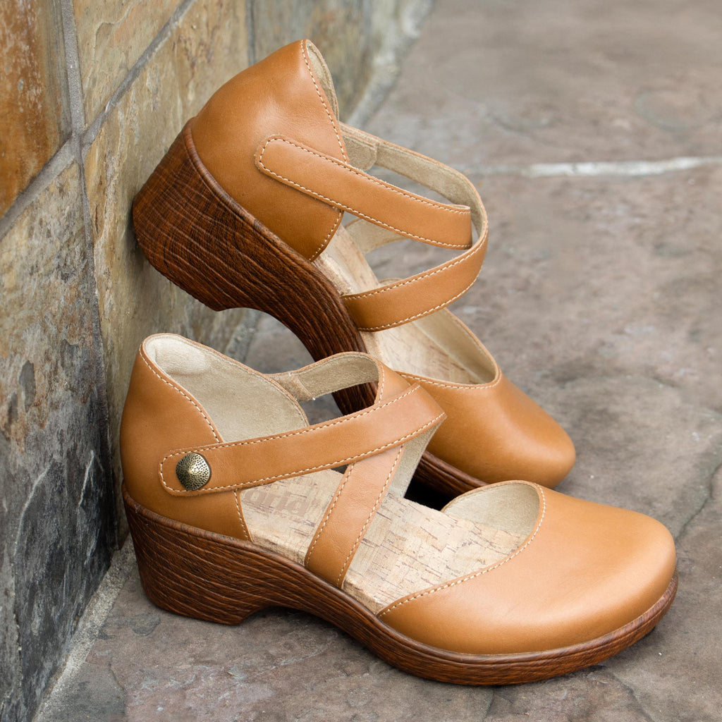 Savina Latte shoe with an adjustable strap on a wood look wedge outsole | Brown colored mary jane style shoe on a wedge.