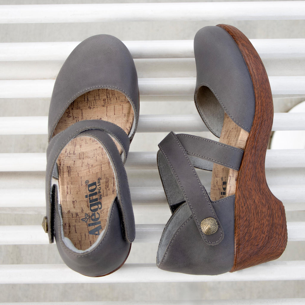 Savina Stone shoe with an adjustable strap on a wood look wedge outsole | Grey colored mary jane style shoe on a wedge.