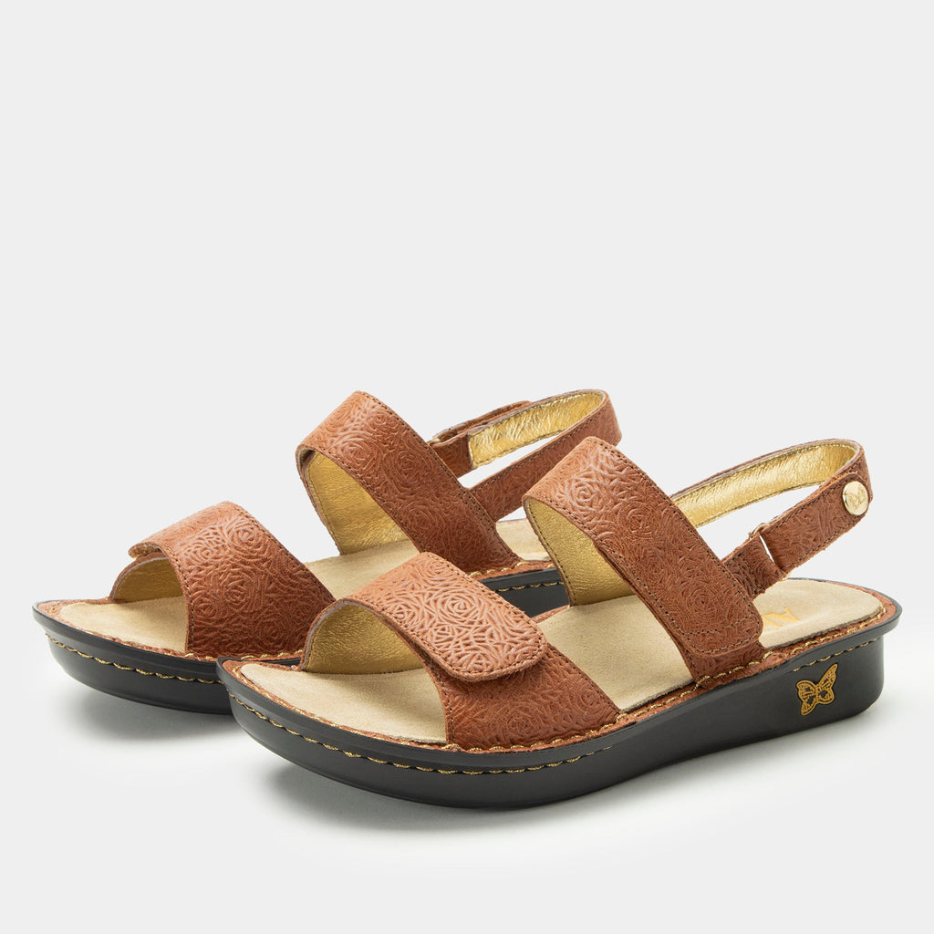 Verona Carmelita three strap adjustable sandal | Brown laser etched multi strap sandal on a mini rocker outsole.