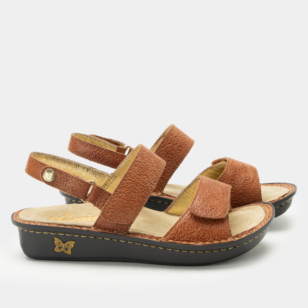 Verona Carmelita three strap adjustable sandal | Brown laser etched multi strap sandal on a mini rocker outsole.