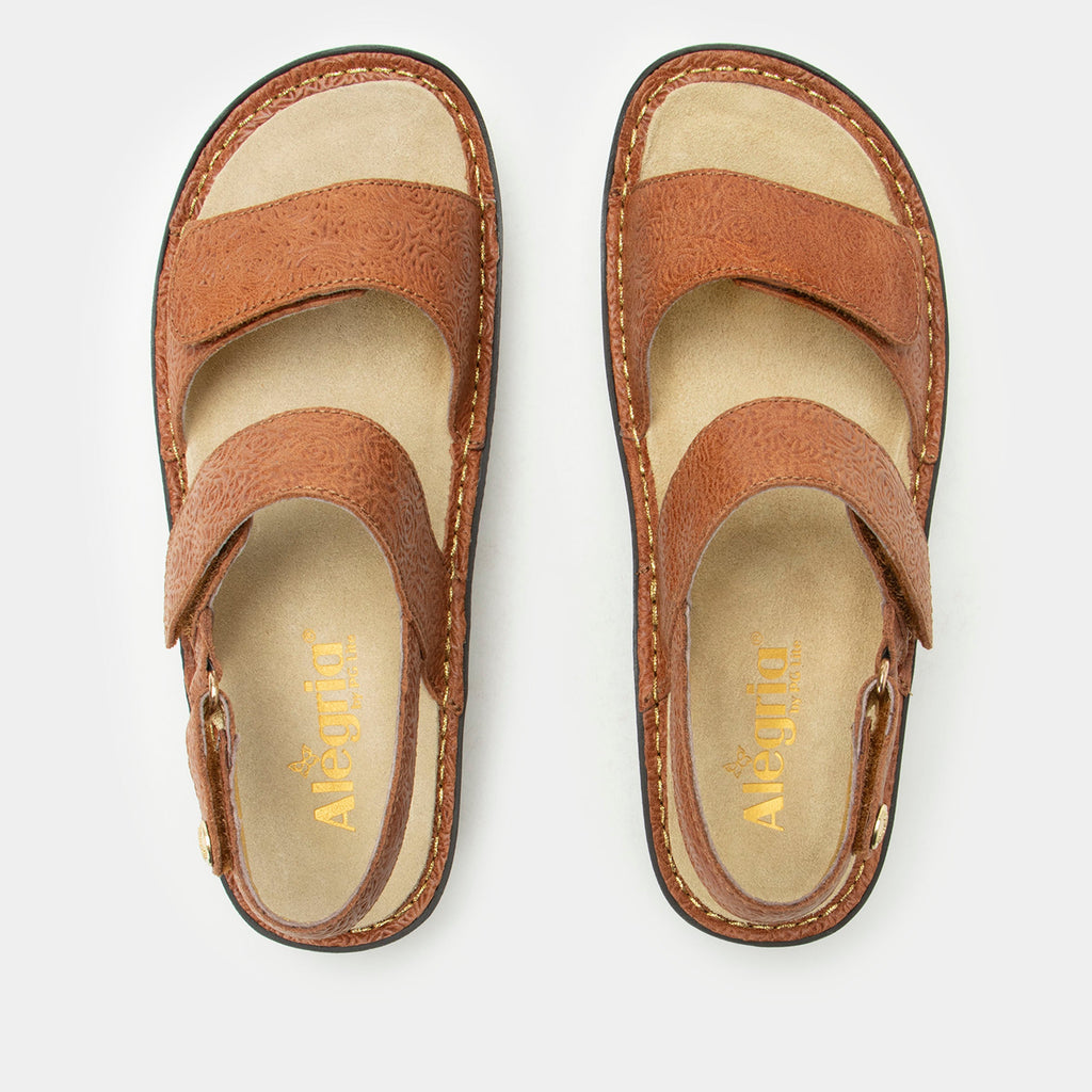 Verona Carmelita three strap adjustable sandal | Brown laser etched multi strap sandal on a mini rocker outsole.