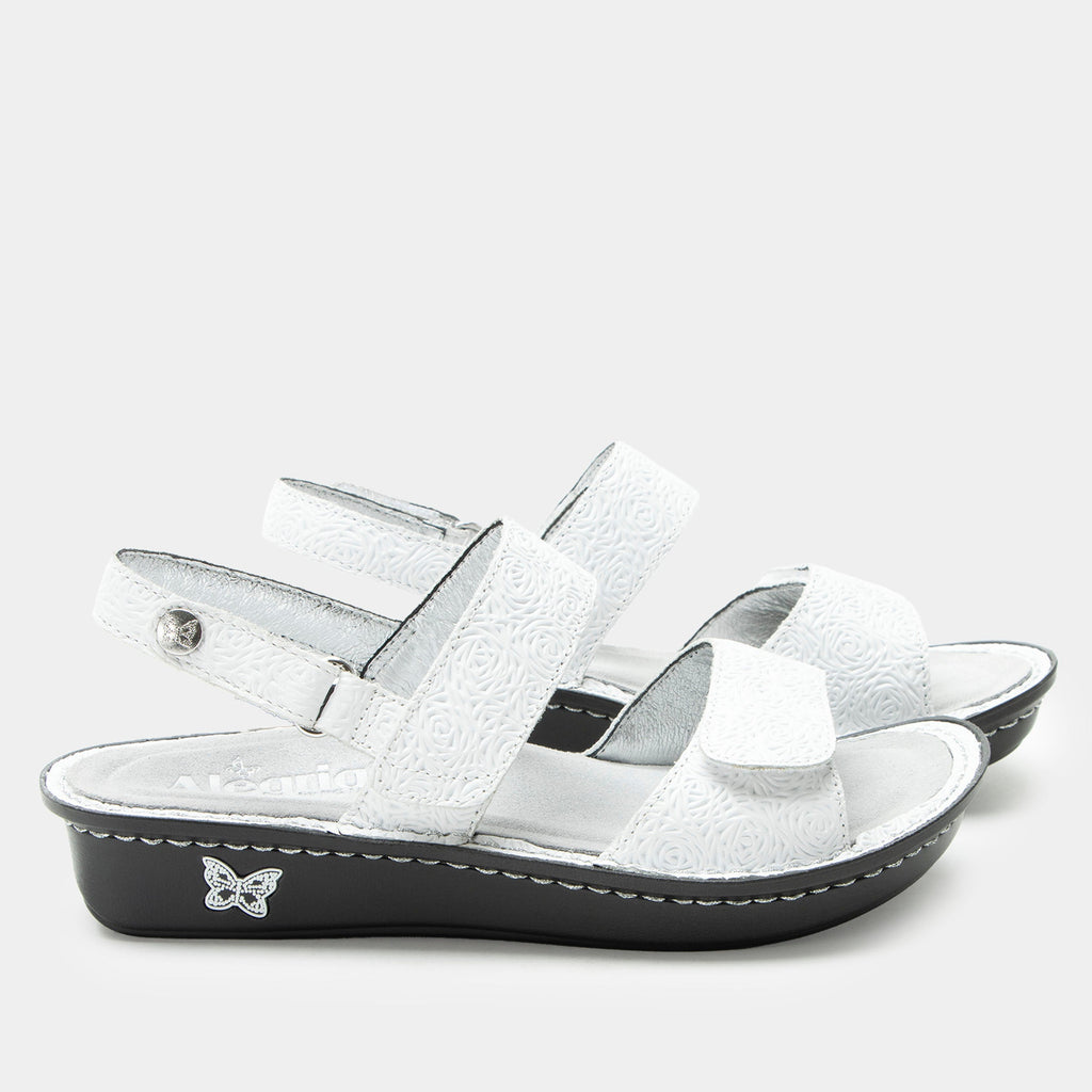 Verona Blancalita three strap adjustable sandal | White laser etched multi strap sandal on a mini rocker outsole.