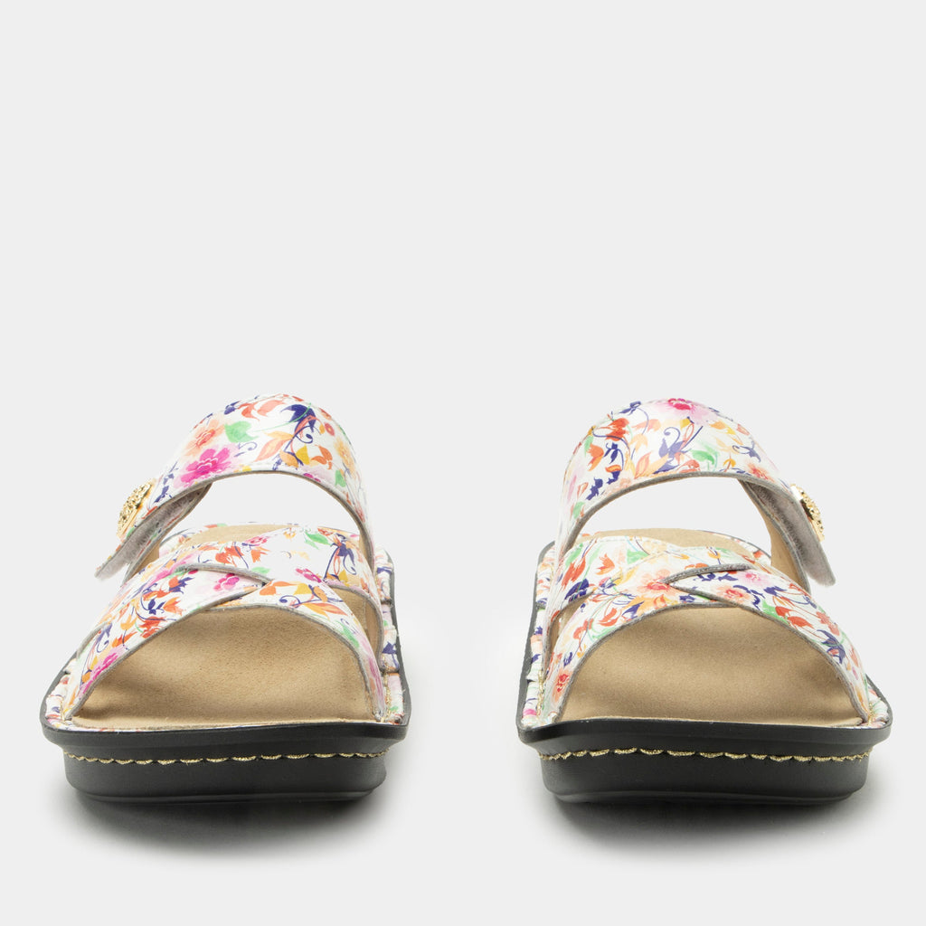 Victoriah Marvel sandal with crisscross detail and adjustable strap| Floral printed slip on sandal on a mini outsole.