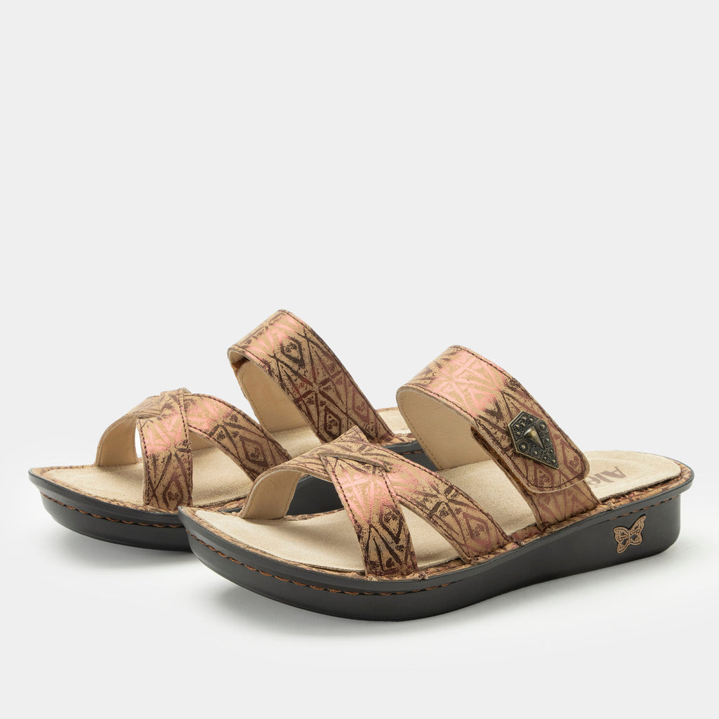 Victoriah Relic sandal with crisscross detail and adjustable strap| Bronze printed slip on sandal on a mini outsole.