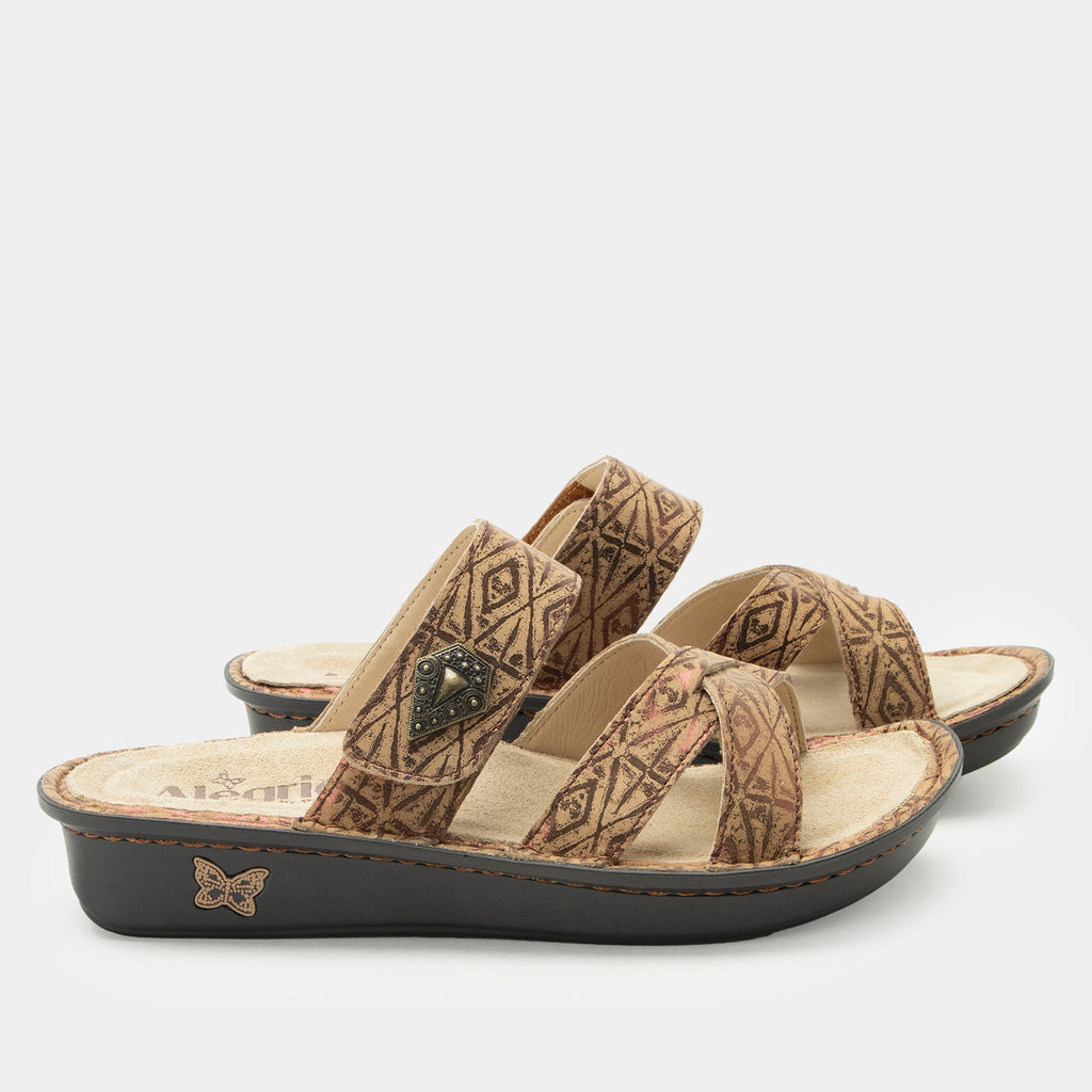 Victoriah Relic sandal with crisscross detail and adjustable strap| Bronze printed slip on sandal on a mini outsole.