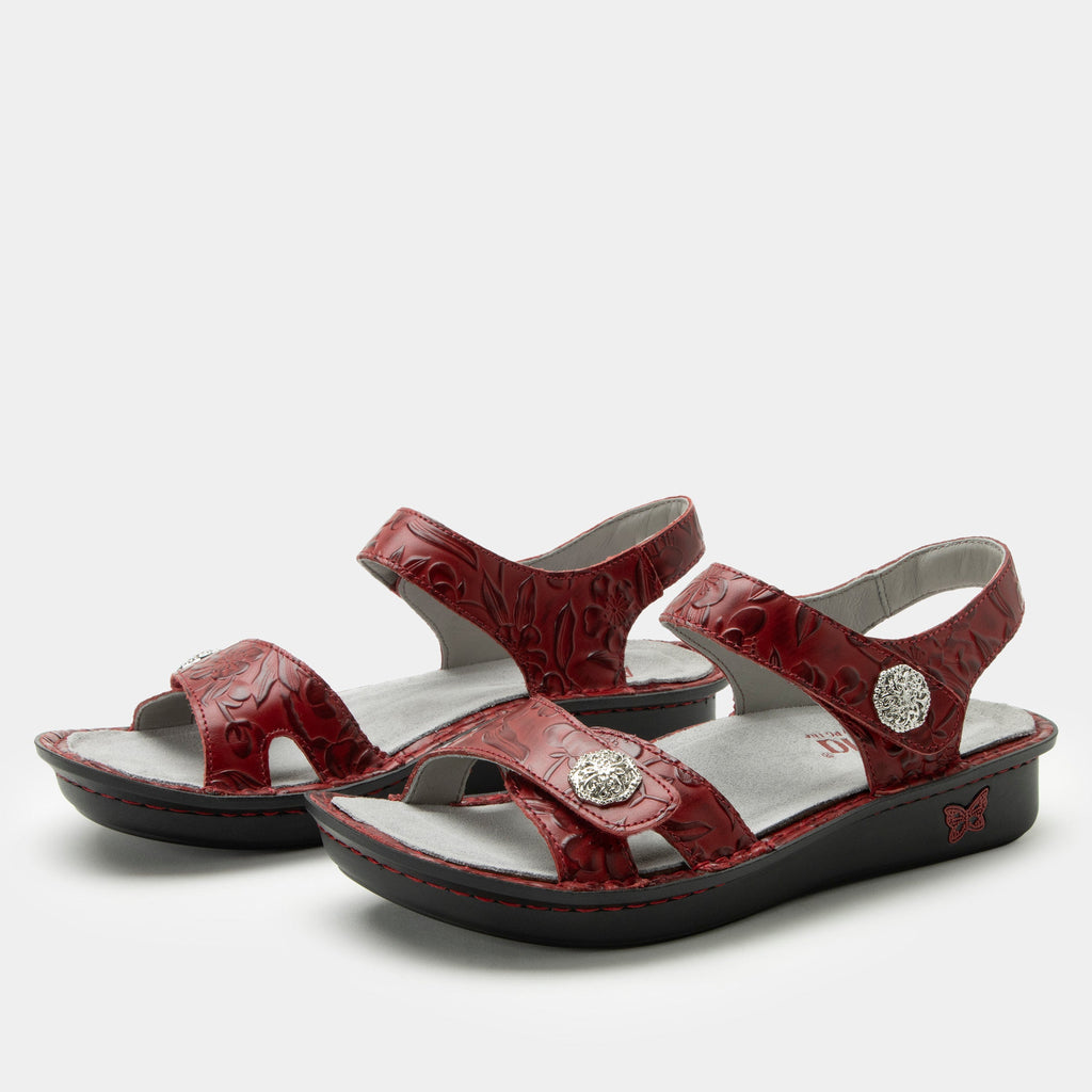 Vienna Loretta Roja Sandal with two adjustable hook and loop closures | Red floral embossed sandal on leather upper.