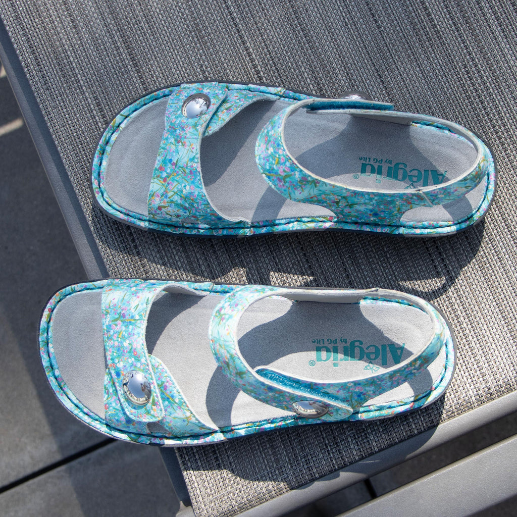 Vienna Aqua Flora Sandal with two adjustable hook and loop closures | Blue sandal with a printed leather upper.