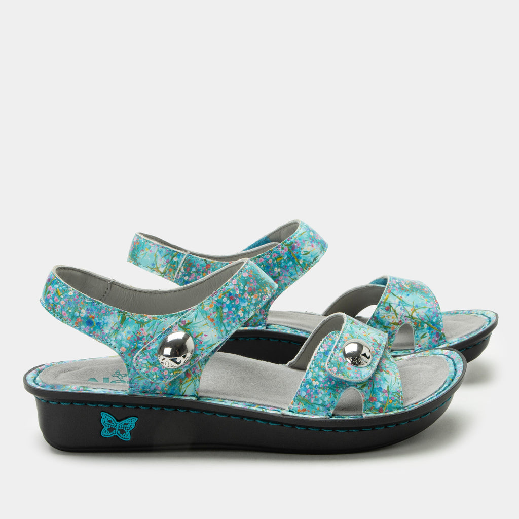 Vienna Aqua Flora Sandal with two adjustable hook and loop closures | Blue sandal with a printed leather upper.