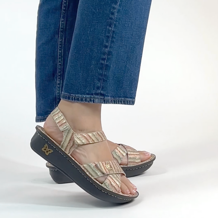 Kelsi Spumoni sandal on the Classic rocker outsole | Multi colored printed stripes on a tan multi strap sandal with leather uppers.