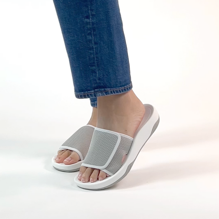 Ova8tion Dove sandal on a Ergo Foam outsole | White and grey slide on sandal with a mesh upper and lining.